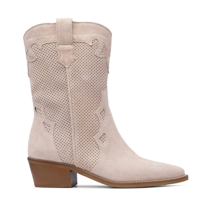 BOTAS TEXANAS FEMININAS EM PELE